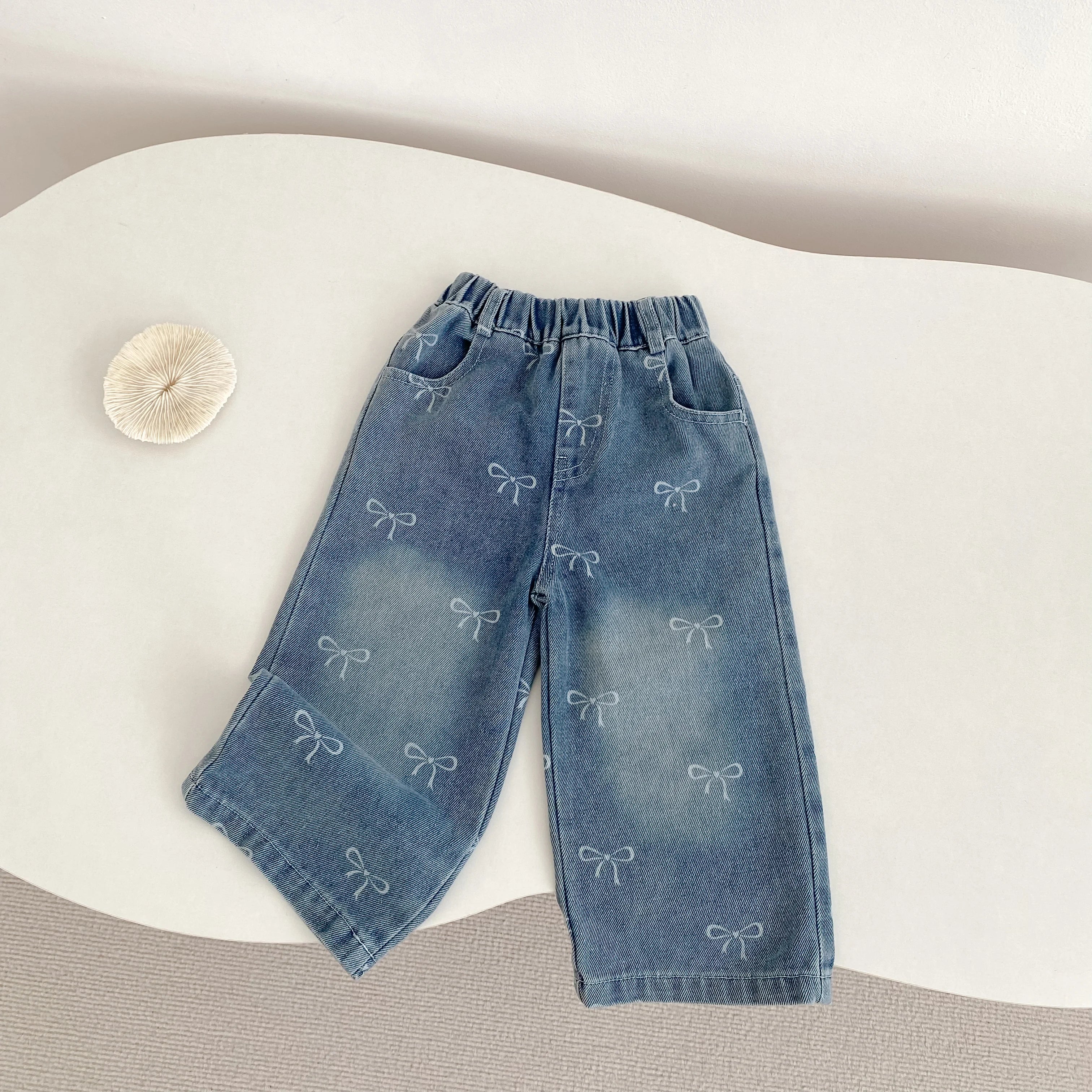 New autumn clothing for babies aged 0-3, with bow printed denim pants for baby girls, fashionable